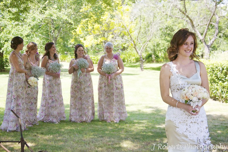 Bride with laughing bridesmaids - wedding photography sydney